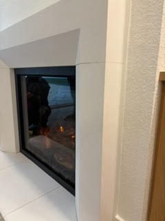 Modern gas fireplace insert in a Bradenton Beach vacation rental living room