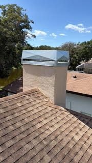 Chimney cap on a Lakewood Ranch home overlooking a neighborhood pond